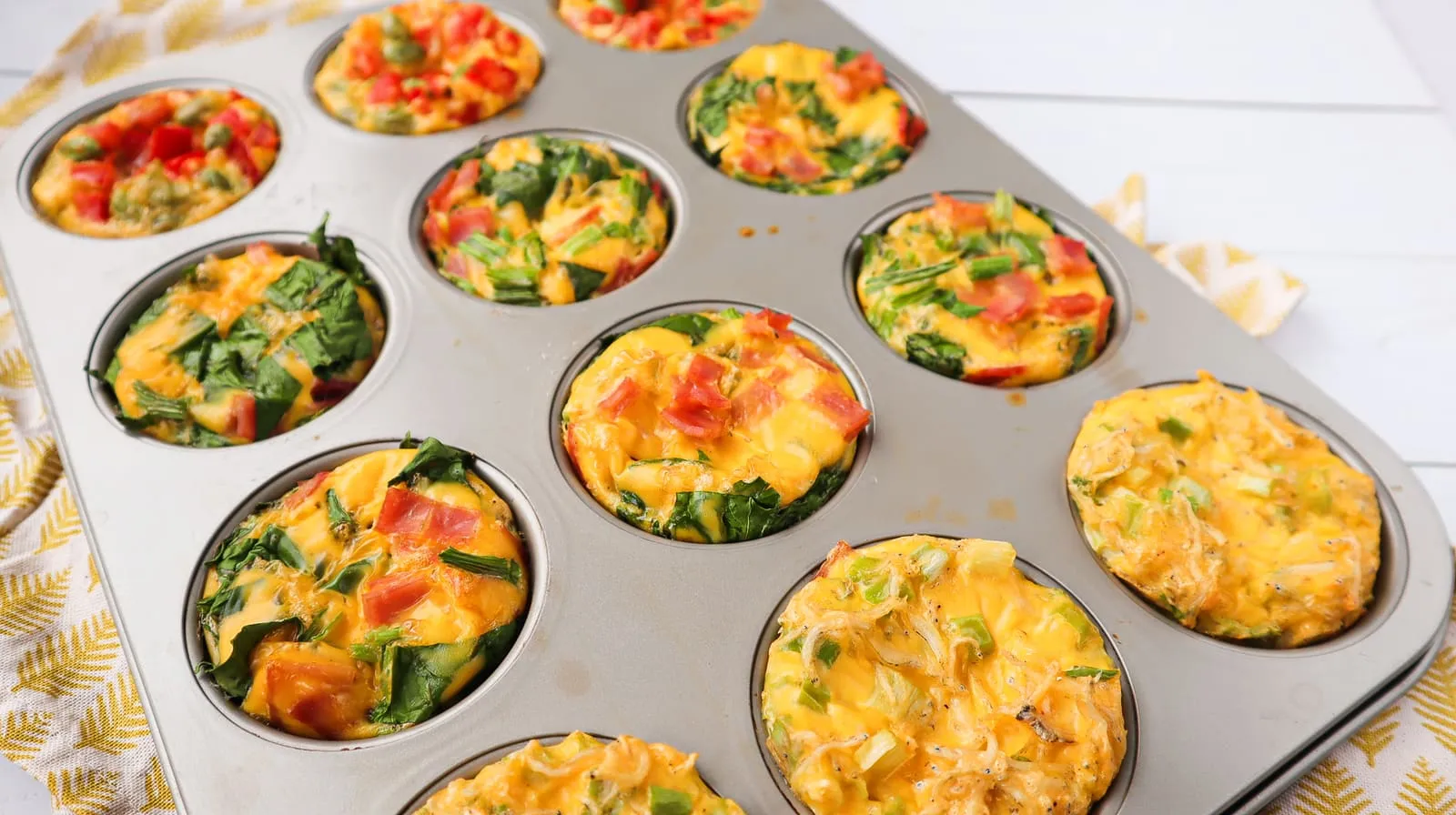 Once the egg muffins have baked and cooled a little, run a steak knife around the edges, then take them out of the muffin tin.
