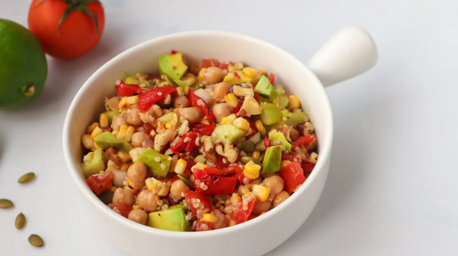 This Mexican-style grilled corn, pepper, and chickpea salad has layered flavors: sweet, tangy, savory, and spicy. It highlights the fresh sweetness of seasonal vegetables and has lots of texture
